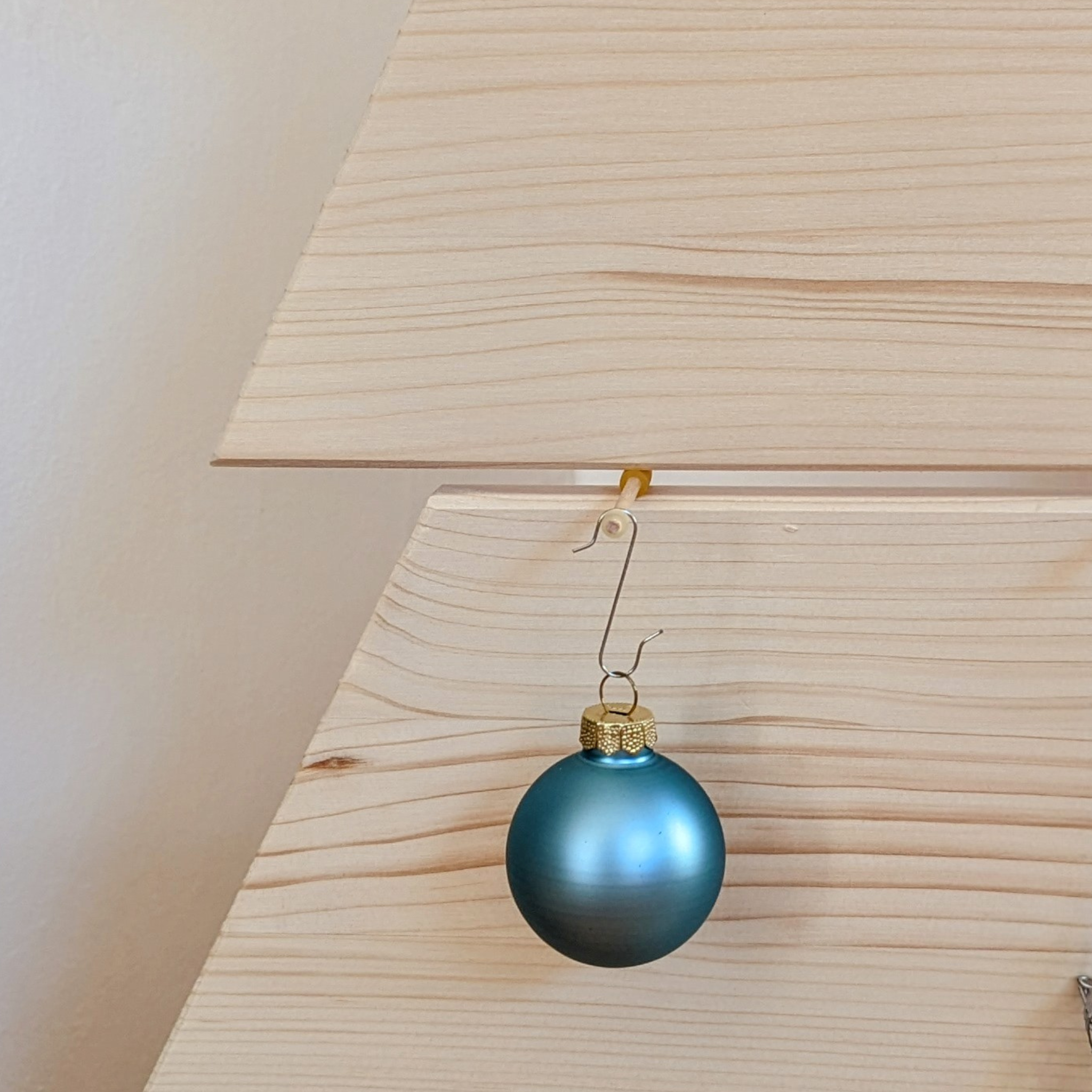 Aufhänghilfen aus Holz mit Gummistopper (8 Stück)